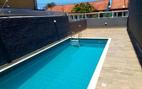 Casa nova frente a praia, com três suítes